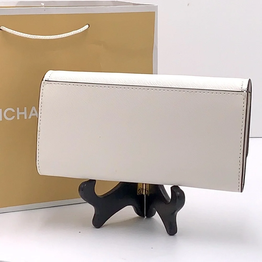 Brand New with Tag
Michael Kors Large Mimi Bifold Wallet
Color: Optic White - Picture 3 of 16